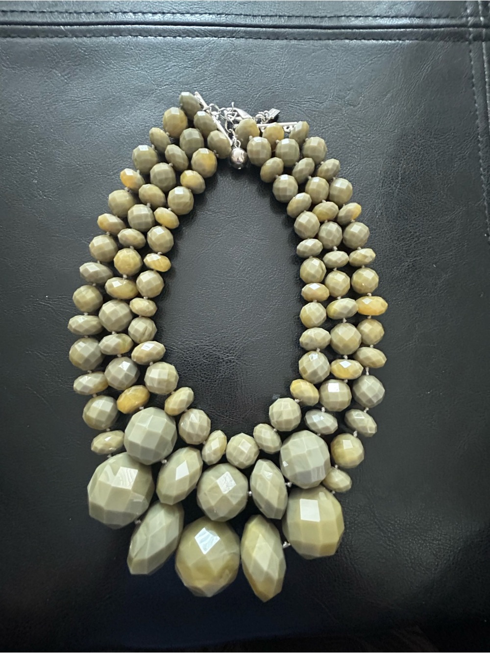 Kate Spade Give it a Swirl triple strand faceted bead necklace in green. Signed.